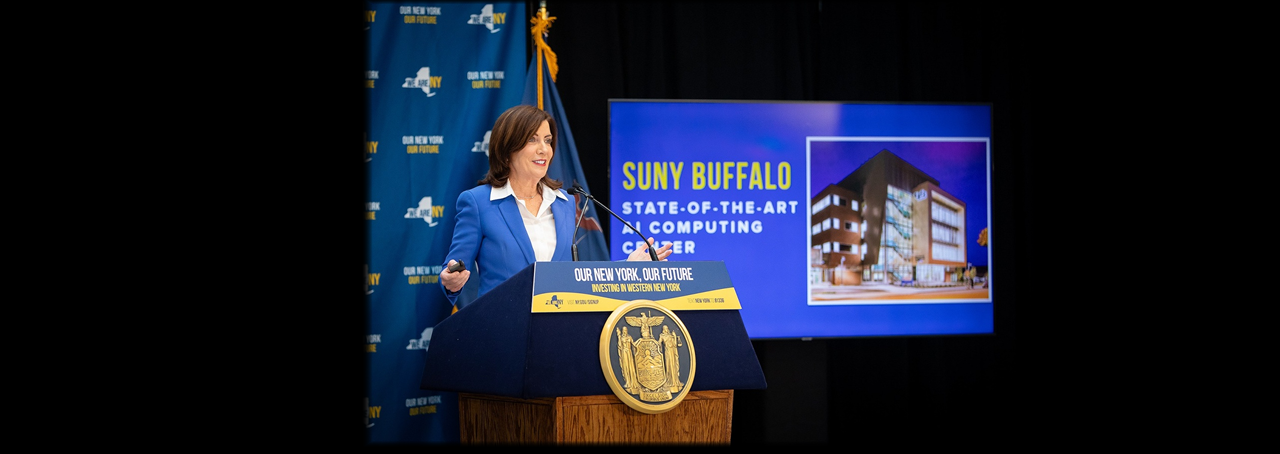 Governor Hochul at podium announcing Empire AI Beta