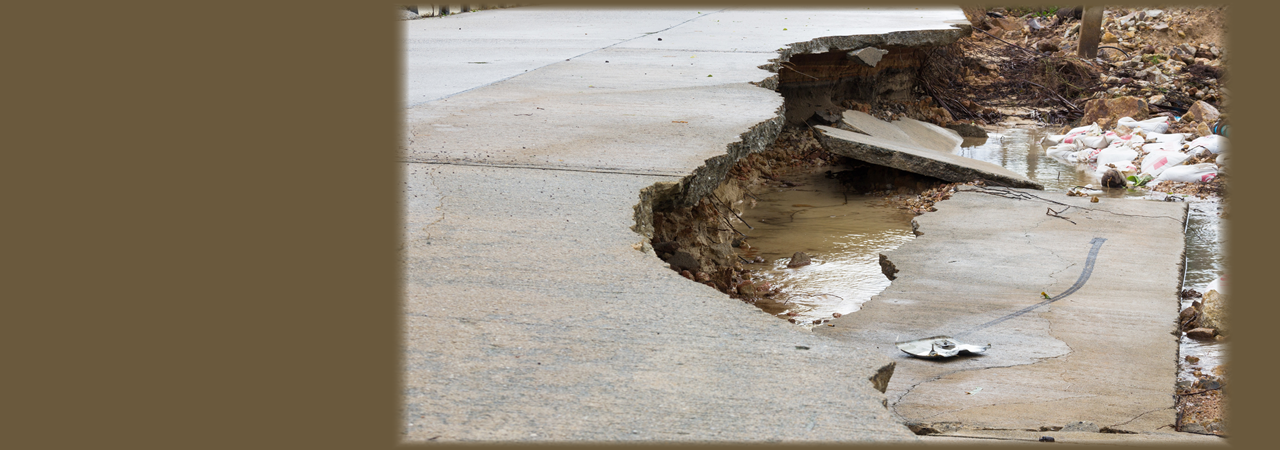 broken road after flooding