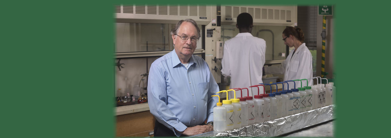 Pioneering researcher M. Stanley Whittingham and his students at his lab at Binghamton Unversity