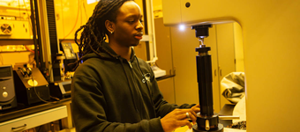 Malcolm John, a mechanical engineering senior at Binghamton University working in the lab