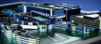 Computer-generated aerial rendering of a modern multi-building research and technology campus at night, featuring illuminated glass facades, interconnected structures, and surrounding roadways