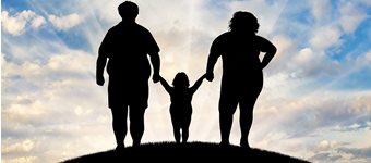 Silhouettes of three obese family members standing on a hill with a bright blue sky in the background.
