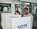 stock image of two people voting
