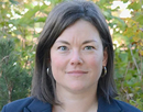 Cortland’s assistant professor Deborah Silvis with trees in the background
