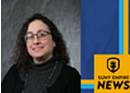 Headshot of a person wearing glasses and a dark turtleneck against a gray background, displayed beside a blue and gold graphic featuring the text “SUNY Empire News”