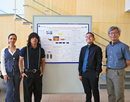 From left to right New Paltz students Marwa Zeroual, David Cacsire Mason Hernandez and their faculty advisor, Associate Professor Ping-Chuan Wang standing in front of their poster on their 3D-printed cooling device at the AC2 Summer Research Program