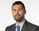 professional photo of associate professor Benjamin Kuettel from SUNY Oneonta
