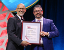 Jason Trelewicz (right) receiving the 2026 Brimacombe Medal.