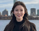 Stony Brook University’s Dr. Jia Ying with skyscrapers in background