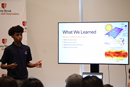 High school student presenting what they learned at the third annual ‘A Taste of the Trades Summer Youth Employment Program’ at Stony Brook University’s Center of Excellence in Wireless and Information Technology (CEWIT)