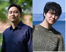 Two researchers stand outdoors side by side in front of a blurred natural background. One researcher wears a dark blue button-down shirt, while the other wears glasses and a green patterned sweater