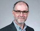 Professional photo of professor Gary Saulnier from University at Albany