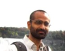 Professional photo of associate professor Philip Goyal from University at Albany