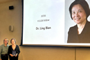Dr. Ling Bian receiving the 2026 UCGIS Fellow award