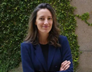 Professional headshot of University at Buffalo associate professor Holly Buck