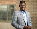 Professional photo of University at Buffalo’s assistant professor of school counseling Jacoby Loury