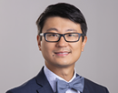 Professional headshot of University at Buffalo clinical assistant professor John Hu