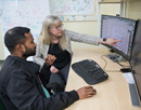 Associate Professor of Chemistry Jennifer Hirschi speaks with postdoctoral researcher Tamal Das in her lab at the Innovative Technologies Complex on July 22, 2026