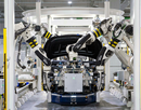 image of robotic assembly line at auto manufacturing plant