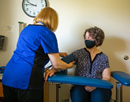 A participant in the Women's Health Initiative having her blood pressure checked